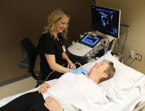 Hammond-Henry Imaging giving a patient an ultrasound